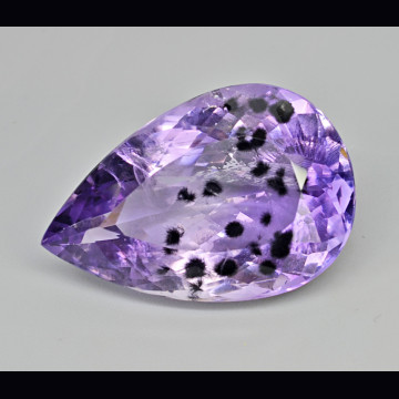 Ametista con hollandite  34.69 ct.